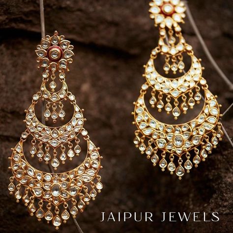 This resplenent pair of chandelier polki chand baalis with intricate detailing is so worth owning! #chandbaali #shaadisaga #bridaljewellery #bride #bridegoals #bridalgoals #jewellery #earrings #weddinginspo #weddinginspiration #bridalinspo #bridalinspiration #weddingjewellery Indian Western Outfits, Aesthetic Crescent Moon, Chand Bali Earrings, Chand Bali, Bridal Jewellery Earrings, Kundan Jewellery Bridal, Indian Jewelry Earrings, Bali Earrings, Indian Jewellery Design Earrings