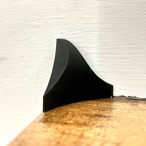 If You See These Triangles on Stairs, This Is What It Means Stair Corner Dust Cover, Dust Corners, Corner Stairs, Car Window Repair, Under Deck Roofing, Easy Shelves, Shaker Cabinet Doors, Soundproof Room, Laundry Room Layouts