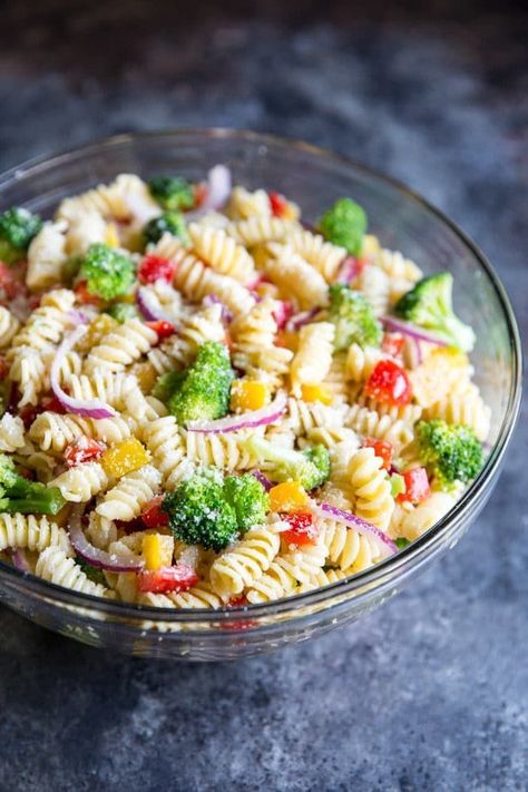 An easy Cold Pasta Salad recipe with broccoli, peppers, zesty Italian dressing and Parmesan cheese. Make it ahead; the flavor gets even better as it sits! #pastasalad #easypastasalad Pasta Salad With Broccoli, Easy Cold Pasta Salad, Cold Pasta Recipes, Salad With Broccoli, Rotini Pasta Salad, Broccoli Pasta Salads, Pasta Con Broccoli, Chicken Pasta Salad Recipes, Cold Pasta Salad Recipes