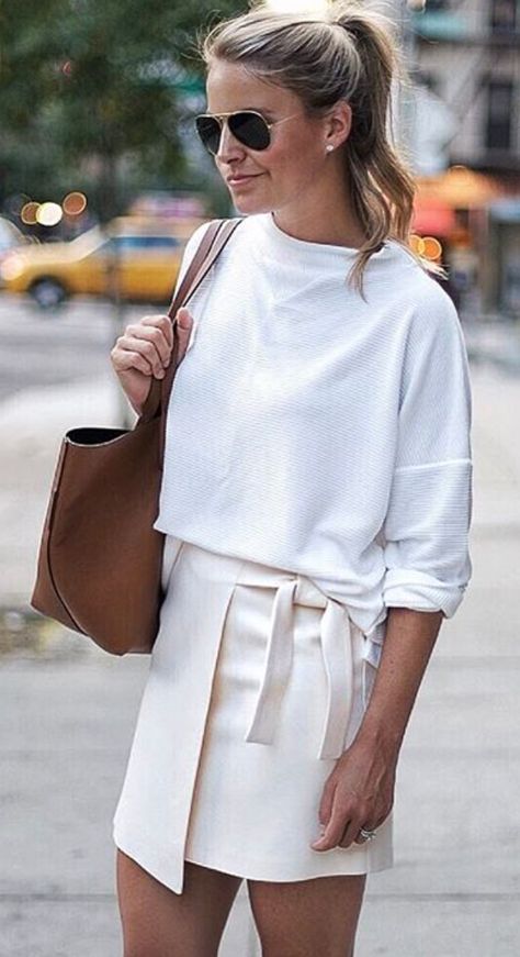 Spring style - white wrap skirt, tie detail, white sweatshirt, high ponytail - street style Beige Skirt Outfit, Wrap Skirt Outfit, White Wrap Skirt, Wrap Mini Skirt, Miniskirt Outfits, Fashion Now, Casual Chic Outfit, Neutral Fashion, Skirt Outfit