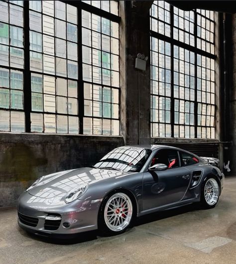 The 2007 Porsche 911 Turbo (997) features a 3.6L flat-six engine with twin turbochargers and 480hp. With a top speed of 310 km/h and 0-100 km/h in 3.7 seconds, it's a high-performance beast. Options include a metallic grey exterior, Sport Chrono Package, and Cabriolet version for top-down thrills. #Porsche #911Turbo #SportsCar #LuxuryCars #Supercar #Convertible #CarEnthusiast #AutoLifestyle #CarGoals #997Turbo #PerformanceCars Porsche 911turbo, Porsche Techart, Porsche 997 Turbo, 997 Turbo, Porsche 996, School Car, Porsche 997, New Luxury Cars, Cars Aesthetic