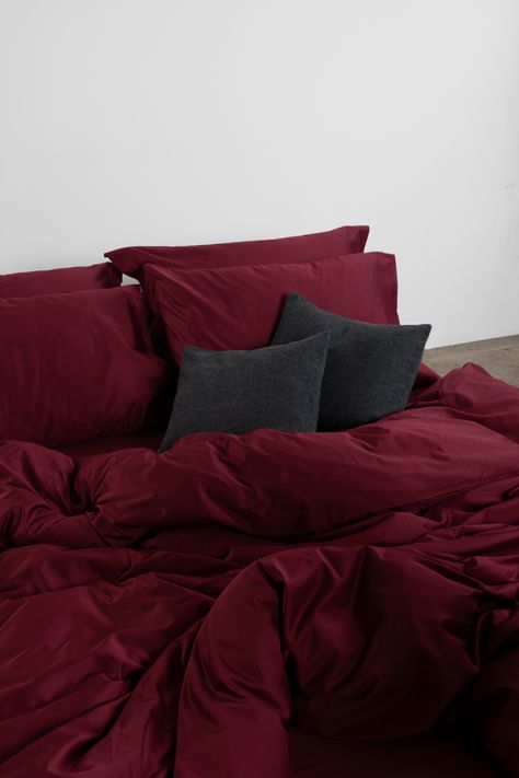 Give your bed an upgrade with our burgundy bedding set. Woven in our signature 400 thread count silky, smooth sateen fabric. Made of 100% premium cotton in Portugal. Red Bedding Set, Burgundy Bedding Set, Red Bed Covers, Red Bedsheets Aesthetic, Black And Red Bedding, Red Bed Sheets Aesthetic, Cool Bedding Sets, Red Decor Aesthetic, Burgundy Bedroom Aesthetic