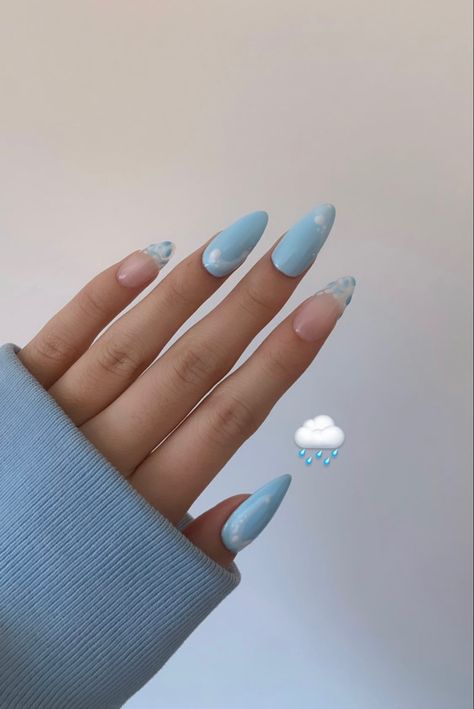 Hand in front of wall showing of baby blue “rainy day puddles” inspired nails. Pinky and pointer fingers have raindrops creating a french tip design while the other fingers have a puddle design. Blue Rain Nails, Rain Inspired Nails, Rainy Season Nails, Rain Nails Design, Rainy Day Nails, Rainy Nails, Rain Nails, Emoji Nails, April Rain