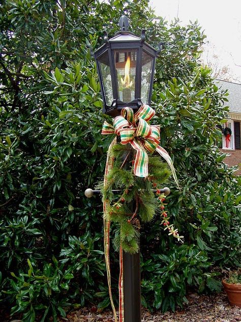 Decorating for Christmas with Magnolia and Pine Decorating A Lantern For Christmas, Outside Xmas Decorations, Best Outdoor Christmas Decorations, Christmas Lamp Post, Lamp Posts, Christmas Lamp, Christmas Decorations Wreaths, Christmas Front Doors, Have Inspiration