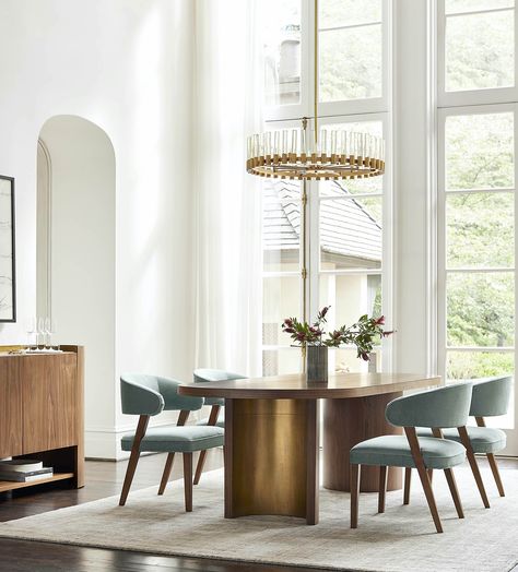 Gather with loved ones around a striking centerpiece. Reminiscent of mid-century Italian design, the Hayes collection’s sculptural curves capture attention. The Hayes Dining Table utilizes elegant American walnut and lightly antiqued brass. Dining Room Table Marble, Dinette Chairs, Dining Table Gold, Table Marble, Mitchell Gold Bob Williams, Mitchell Gold, American Walnut, Power Couple, Walnut Veneer