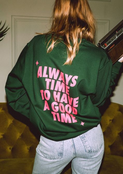 Film camera photo of Woman with back to camera holding a retro radio and wearing a bottle green sweatshirt with neon pink text that reads "Always time to have a good time" Aesthetic Christmas Sweatshirt, Slogan Sweater, Slogan Sweatshirt, Have A Good Time, Cricut Designs, Rock On, Chunky Boots, Retro Aesthetic, Comfy Casual