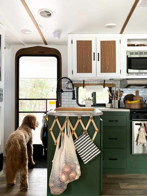 Dark Green Camper Cabinets, Camper Remodel Hacks, Funky Camper Remodel, Camper Murphy Bed Diy, Lake House Camper Decor, Rv Decorating Ideas Green, Camper Interior Hacks, Camper Renovation Living Room, Hygge Rv Decor