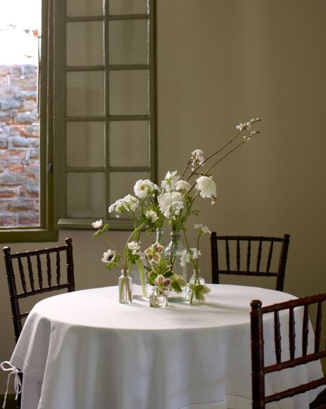 White Ranunculus Centerpieces Martha Stewart Weddings Flowers, White Orchid Centerpiece, Ranunculus Centerpiece, Whimsical Wedding Theme, White Wedding Centerpieces, White Floral Centerpieces, Orchid Centerpieces, White Centerpiece, White Ranunculus