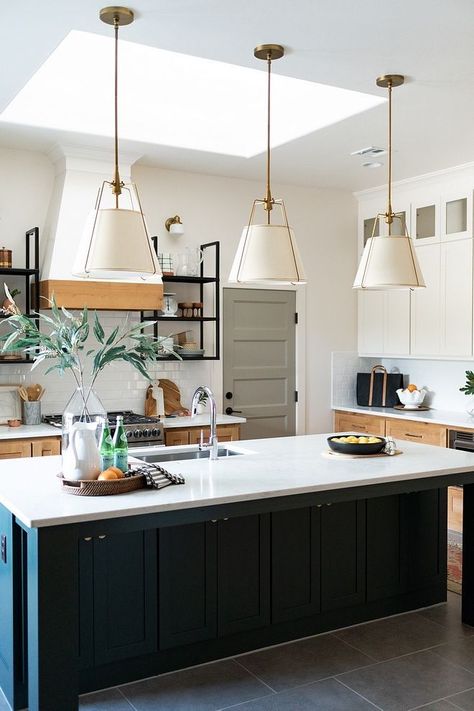 Kitchen island with three pendants Size How many pendants to use on large islands Large islands can handle 2 large or 3 medium pendants These are 16" each #kitchenislandpendants #Kitchenisland #threependants #Howmanypendantstouseonislands Kitchen Paint Color, Kitchen Island Storage, Lights Over Kitchen Island, Mid Century Modern Farmhouse, Black Kitchen Island, Color Kitchen, Farmhouse Kitchen Island, Modern Kitchen Island, Home Bunch