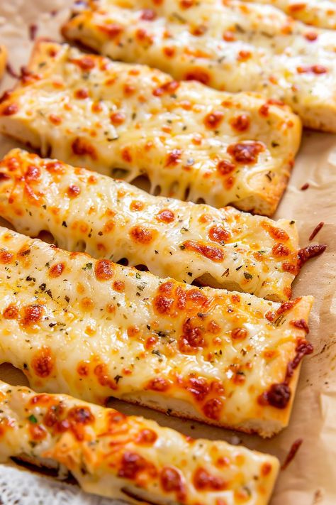 Whip up these heavenly Garlic Parmesan Breadsticks in no time! Featuring a delightful mix of aromatic garlic and rich cheeses atop a homemade dough, these breadsticks are the perfect addition to any meal. They're golden, cheesy, and have that irresistible pull-apart goodness. Ideal for parties or a family dinner, they're sure to impress. Don’t forget to pin this recipe for an easy go-to that’s both delicious and satisfying. Try them tonight! Homemade Garlic Fingers Recipe, Easy Garlic Breadsticks Recipe, Easy Cheesy Bread Recipes, Garlic Fingers Recipe, Cheesy Breadsticks Pizza Dough, Breadsticks With Pizza Dough, Garlic Parmesan Breadsticks, Parmesan Breadsticks, Pizza Type Recipes