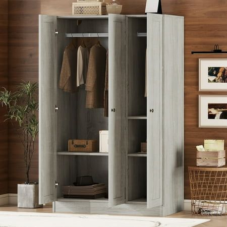 Description Modern 3-door bedroom wardrobe, shelves and hanging rail. Ideal for bedrooms with a modern decor theme. Gray will match most modern room decor themes according to most interior designers. The storage combination provided on this free-standing wardrobe will allow the user to arrange all items without having to compromise on the look of their bedroom. Long modern black handles add quality to this wonderful wardrobe. Larger than most 3-door wardrobes yet small enough to fit into small b Diy Freestanding Closet With Doors, Room Decor Themes, Standing Wardrobe, Wardrobe With Shelves, Gray Closet, Wardrobe Shelves, Closet Storage Cabinets, Modern Armoire, Wooden Armoire