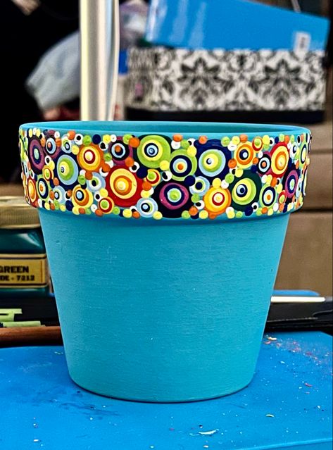 So many dots on dots decorating this little flower pot I think it turned out visually pleasing. Pot Dot Painting, Dot Painting On Flower Pots, Flower Pot Dot Painting, Polka Dot Flower Pots, Dot Art Plant Pot, Terra Cotta Pot Crafts Diy, Flower Pot Art, Painted Clay Pots, Terra Cotta Pot Crafts