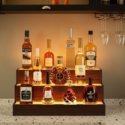 Details:Elevate your home bar or party with our LED Lighted Liquor Bottle Display Shelf. This DIY illuminated shelf boasts over 100 lighting effects, customizable via app or remote control. Liquor Bottle Display, Hanging Wine Glass Rack, Wine Bottle Rack, Whiskey Bar, Bottle Display, Bar Displays, Wine Glass Rack, Glass Rack, Bottle Rack