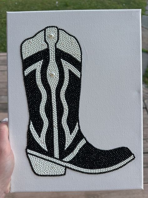 Black and white beaded cowboy boot canvas perfect for decorating your room! The beads shimmer in the light and a 3D effect to the piece. Western Wall Decor Diy, Bead Art Canvas, Cute Western Paintings, Bedazzled Wall Art, Cowboy Boot Drawing, Bedazzled Canvas, Bedazzled Art, Cowboy Boots Drawing, Beaded Canvas