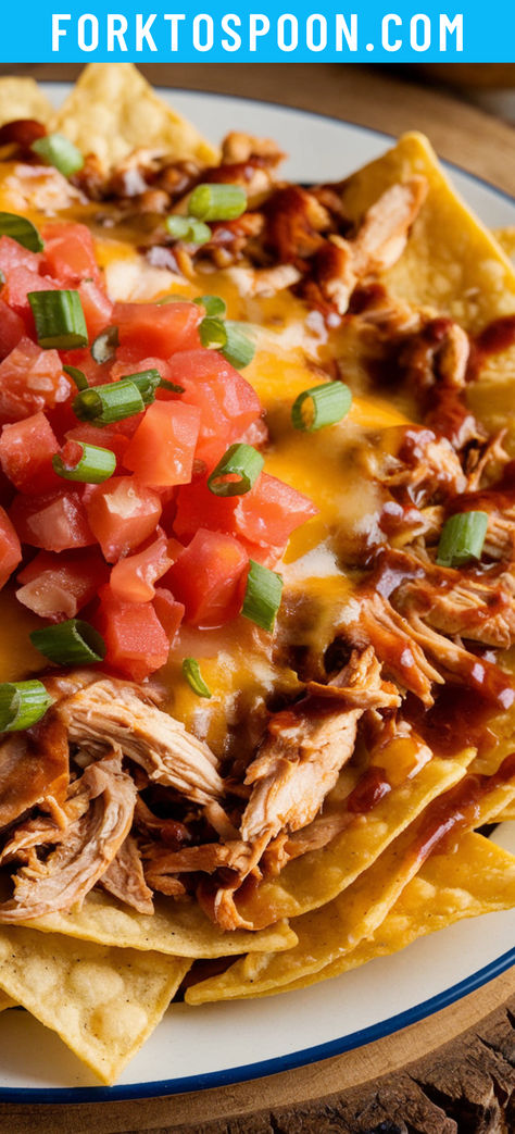 These BBQ chicken nachos are a delicious twist on the classic, featuring shredded BBQ chicken, gooey melted cheese, ranch drizzle, and fresh cilantro layered over crispy tortilla chips. Bbq Chicken Tostadas, Sour Cream Ranch Dressing, Bbq Chicken Nachos, Shredded Bbq Chicken, Monthly Meal Plan, Football Appetizers, Chicken Tostadas, Meal Plan Recipes, Breaded Chicken Breast