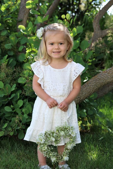 Not able to toss petals? That's okay let your flower girl carry a heart wreath to remind the guests that your wedding is a day filled with love.  A sweet little hair clip to match makes this set the sweetest accessory ever to a wedding day!  Made with gyp, white waxflower and larkspur blossoms. Alternatives For Flower Girls To Carry, Flower Girl Ideas To Carry, Baby Flower Girl Walker, Wedding Daughter Flower Girl, Bride With Flower Girl, Flower Girl Flowers, White Waxflower, Bride And Flowergirl Picture, Flower Girl Wreaths