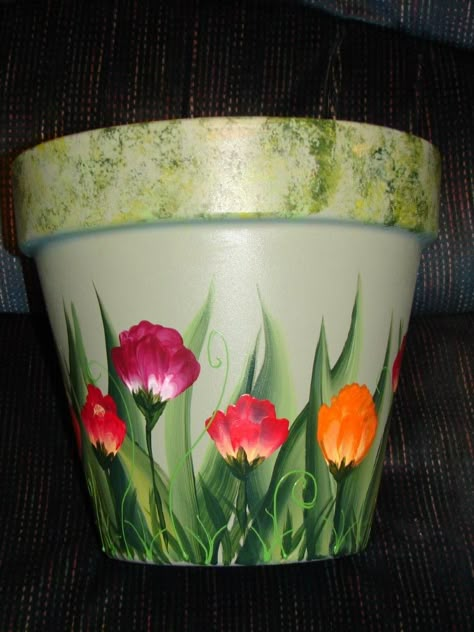 Clay Pot - Painted vibrant florals on this clay pot.  Used Plaid FolkArt outdoor paint.  You can also use acrylic and spray with a sealer. Painted Flower Pot, Painting Clay, Clay Pot Projects, Flower Pot Art, Pot Painting, Terra Cotta Pot Crafts, Painted Pots Diy, Painted Plant Pots, Flower Pot Design