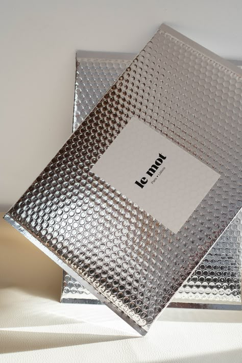 silver big envelope Packaging Envelope, Retail Store Interior Design, Silver Packaging, Packaging Ideas Business, Clothing Packaging, Fashion Packaging, Branding Design Packaging, Small Business Packaging, Phone Shop