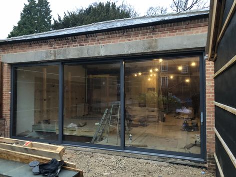 These large Dutemann Glide S sliding doors were recently installed in customers home, so they could have an unitnterupted view of their garden all year round. #SlidingDoors #Sliders #AnthraciteGrey #Dutemann #DutemannGlideS #Dutemann #Basfords #Basfordseffect #BasfordsDifference Triple Sliding Doors, Beautiful Bungalows, External Glass Doors, Dark House Exterior, Large Sliding Doors, Kitchen Sliding Doors, Nosy Neighbors, Outdoor Privacy Screen, Sliding Patio Door