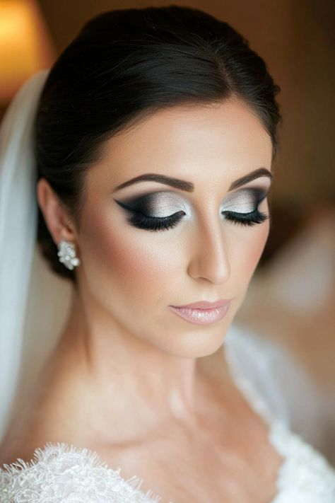 These 55 dramatic wedding makeup looks are everything a bold bride dreams of. From rich jewel-toned eyeshadows to flawless airbrushed finishes, these styles ooze sophistication. Whether you want a timeless look or something trend-forward, these ideas deliver. Don’t miss the full list! #bridalmakeupinspo #dramaticstyle #weddingtrends Dramatic Bridal Makeup, Dramatic Winged Eyeliner, Light Smokey Eye, Champagne Eyeshadow, Dramatic Wedding Makeup, Bridal Makeup Ideas, Dramatic Wedding, Silver Eyeshadow, Flower Makeup