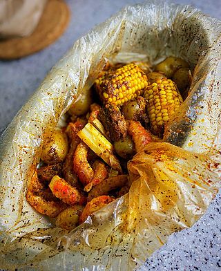 Vegan Crab Boil Recipe, Vegan Low Country Boil, Veggie Seafood Boil, Vegan Shrimp Boil, Vegan Boil Recipes, Vegan Crab Boil, Vegetarian Seafood Boil, Vegetarian Boil, Vegan Seafood Boil