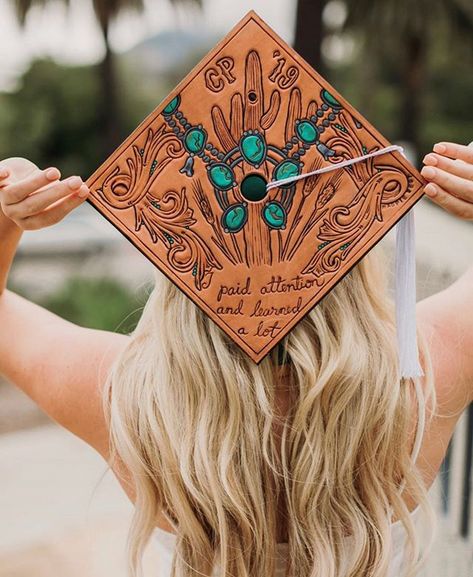 Original tooled grad cap by Magpie West Leather Co. Tooled leather grad cap, western chic, tooled leather, rodeo outfits, western fashion, western chic, leather work, squash blossom, ranch style, cowgirl style, western accessories Leather Grad Cap, Elizabeth Hay, Graduation Cap Decoration Diy, High School Graduation Cap, College Graduation Cap Decoration, Grad Hat, Grad Cap Designs, Diy Graduation Cap, Cal Poly