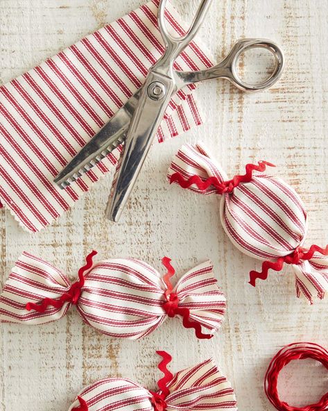 craft made from striped red and white fabric made to look like oversized peppermints December Crafts, Red Christmas Ornaments, Easy Holidays Crafts, Peppermint Christmas, Homemade Christmas Decorations, Christmas Craft Projects, Christmas Crafts To Make, Easy Christmas Crafts, Easy Christmas Diy