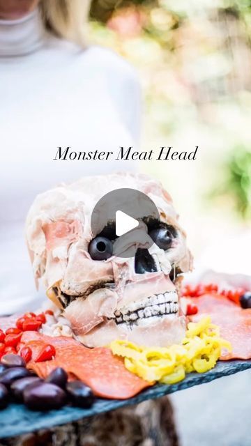 Andrea LeTard | Recipes from a Personal Chef on Instagram: "HALLOWEEN RECIPE SERIES - Monster Meat Head Full recipe below ⬇️ What You’ll Need: A plastic or styrofoam skull head A dark or wooden board 12 to 16 ounces of prosciutto or similar meat Pepperoni (as much as you need to fit on your board, feed your guests) Salami (as much as you need to fit in your board, feed your guests) Turkey, Ham, or both (as much as you need to fit in your board, feed your guests) Kalamata Olives Banana Peppers Petits Poivrons or cherry tomatoes Anything else you like with your meat Place skull in the center of the board. Drape prosciutto over the skull head (make sure the head is clean before you begin). You may have to tear and stick meat together as you go. Assemble the rest of the meats with t Skull Monster, Turkey Ham, Banana Peppers, Meat Platter, Halloween Recipe, Halloween Dinner, Stuffed Banana Peppers, Personal Chef, Kalamata Olives