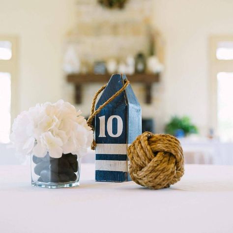 41 Likes, 4 Comments - Chrissy (@lake_shore_home) on Instagram: “Thank you so much for sharing your beautiful photos with me. #lakeshorehome #etsy #etsyshop…” Buoy Wedding Centerpiece, Nautical Wedding Table Decor, Navy Wedding Decor, Crab Feed, Montauk Wedding, Sailing Party, White Wood Table, Nautical Ideas, Event Entrance