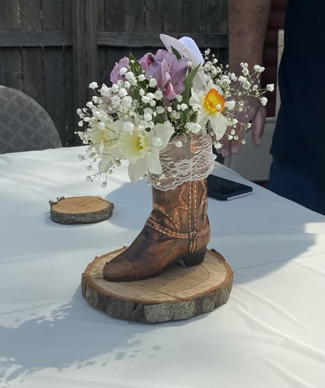 Cowboy Anniversary Party, Boots And Bow Ties Theme, Western Quince Decorations, Cowboy Boot Centerpieces Wedding, Western Graduation Centerpieces, Country Centerpieces Party, Cowboy Boot Table Centerpieces, Cowgirl Themed Centerpieces, Boot Centerpieces Quinceanera