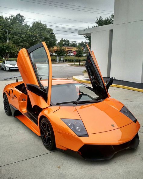 Lamborghini Murcielago Super Veloce painted in Arancio Atlas  Photo taken by: @drivingforceclub on Instagram Lamborghini Car Photo, Lamborghini Murcielago Sv Wallpaper, Lamborghini Egoista, Murcielago Lp640, Lamborghini Performante, Lamborghini Murcielago Sv, Cool Truck Accessories, Lamborghini Murcielago, Fast Sports Cars