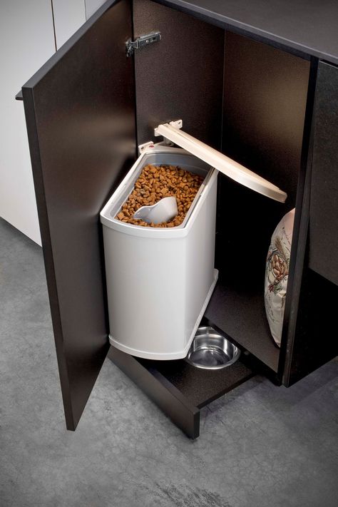 Where do you store your pet's food and supplies? Many with pets use the laundry room to store supplies or build a dedicated feeding area. We recommend a door mounted waste bin like this for pet food. The lid tilts up for easy access to the kibble while under mount slides make bowls easy to access and store when needed. White Bin, Cabinetry Hardware, Kitchen Wardrobe, Kitchen Solutions, Panel Door, Waste Bin, Dog Food Storage, Waste Management, Trash Bin