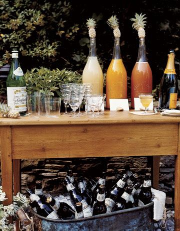 drink bar for an outdoor country rehearsal dinner mimosas bellinis etc Outdoor Mimosa Bar, Outdoor Drink Table, Drink Table Ideas, Drinks Buffet, Drink Buffet, Bellini Bar, Pineapple Wine, Drink Stations, Soda Bar