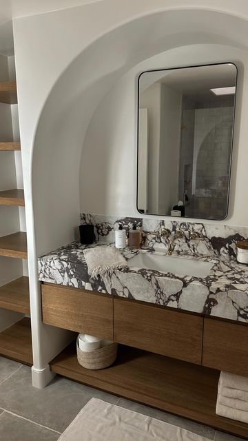 SIVAN AYLA on Instagram: "Help me style our new bathroom 🪄 #remodel #interiors #homedecor #bathroomremodel #sivandiego" Thick Marble Countertop Bathroom, Shower Porcelain Tile Ideas, Sivan Ayla Bathroom, Sivan Ayla Home, Marble Vanity Bathroom, Parisian Bathroom French Style, Bathroom Ideas Marble, Appartment Interiors, Calacatta Bathroom