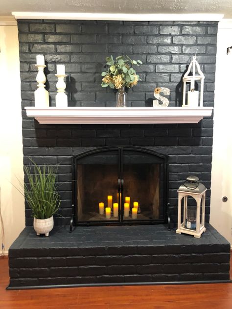 Black Brick Fireplace White Mantle, Black Fireplace Ideas Brick, Black Fireplace With White Mantel, Brick Chimney Makeover, Black Brick Fireplace Living Room, Dark Grey Painted Brick Fireplace, Charcoal Painted Brick Fireplace, Black Chimney Fireplaces Painted Bricks, Black Chimney Fireplaces