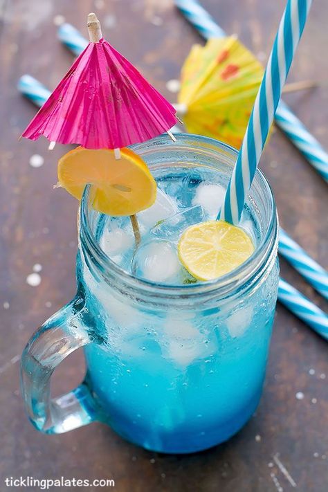 Blue Lagoon Non Alcoholic Curacao Mocktail Recipe | Tickling Palates Blue Curacao Drinks Non Alcoholic, Blue Lagoon Drink Non Alcoholic, Non Alcoholic Blue Drinks, Blue Lagoon Mocktail Recipe, Blue Mocktails Non Alcoholic, Blue Lagoon Mocktail, Summer Drinks Nonalcoholic, Virgin Drinks, Blue Drink