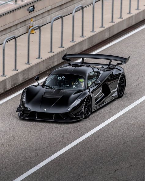 The track-focused @hennesseyperformance Venom F5 Revolution has set a new production car lap record at Circuit of The Americas, and a 300mph attempt is up next. Read the story at the link in our bio. #evomagazine - - - #Hennessey #HennesseyVenom #VenomF5 #HennesseyVenomF5 #COTA #Circuitoftheamericas #HennesseyPerformance Hennessey Venom F5, Hennessey Venom, Futuristic Cars Design, Stanced Cars, Circuit Of The Americas, Super Fast Cars, Cars Design, Custom Bobber, Cool Sports Cars