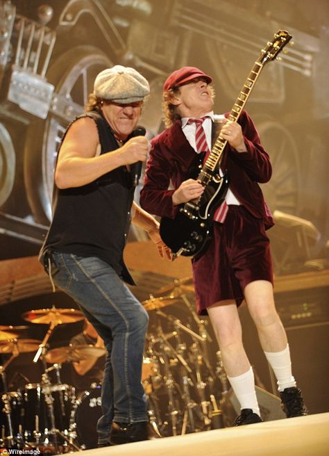 Brian Johnson and Angus Young performing during the 'Black Ice' tour in 2008 in Wilkes-Barre, Pennsylvania Acdc Costume Halloween, Acdc Costume, Brian Johnson Acdc, Ac Dc Guitarist, Classic Rock Artists, Aesthetic 70s, Celebrity Mugshots, Dc Costumes, Acdc Angus Young