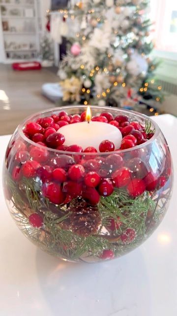 Dayna Zingarella on Instagram: "CHRISTMAS DIY CENTERPIECE - make sure to rinse the cranberries off first to prevent them from bleeding color as much! #centerpiecesideas #weddingcenterpieces #diycenterpieceideas #christmasideas" Flying Candles, Container Arrangements, Pool Candles, Diy Floating Candles, Christmas Table Decorations Diy, Diy Floral Arrangements, Floating Candles Bowl, Floating Candle Holders, Diy Christmas Table