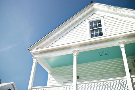 If You See a Blue Porch Ceiling, This Is What It Means Southern Paint Colors, Blue Porch Ceiling, Blue Porch, Haint Blue, Ceiling Painting, Porch Ceiling, Southern Decor, Blue Ceilings, Colored Ceiling