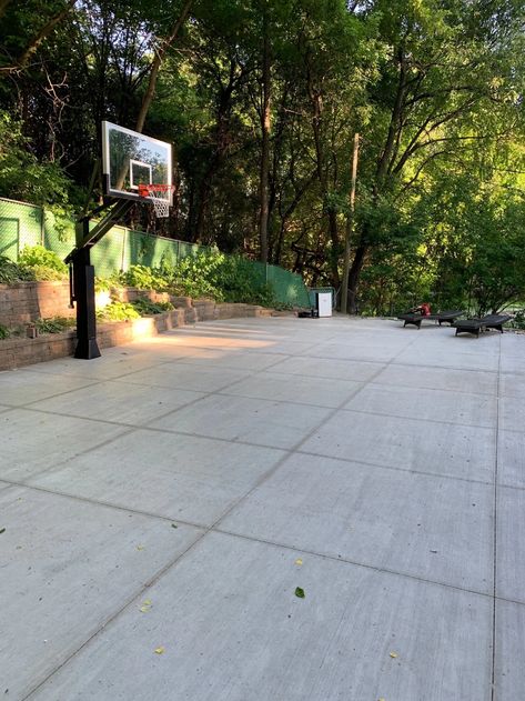 Basketball Court With Pavers, Patio With Basketball Hoop, Landscaping Around Basketball Court, Patio Basketball Court, Stained Concrete Basketball Court, How To Paint Basketball Court Lines On Concrete, At Home Basketball Court, Half Court Basketball Backyard, Small Backyard Basketball Court Ideas