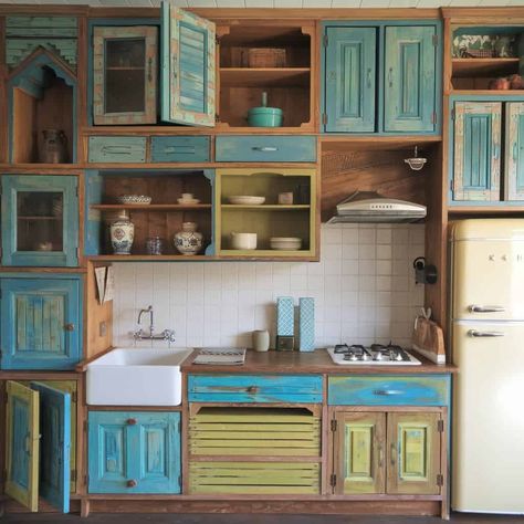 30+ Kitchen Cabinet Designs That Will Make You Swoon Kitchen Door Cabinets Ideas, Original Kitchen Cabinets, Artistic Kitchen Cabinets, Pickled Kitchen Cabinets, Distressed Turquoise Kitchen Cabinets, Salvaged Kitchen Cabinets, Vintage Kitchen Cupboards, Kitchen Cabinets Made From Old Dressers, Recycled Kitchen Cabinets