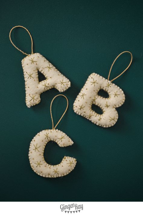 Complete your tree with a personal touch with these felt alphabet Christmas tree decorations. Homemade Letter Ornaments, Felt Letter Embroidery, Felt Ornament Letter, Initial Felt Ornaments, Felt Initial Ornament Diy, Felt Ornaments Letter, Embroidered Felt Ornaments Diy, Felt Initial Ornament, Homemade Felt Ornaments