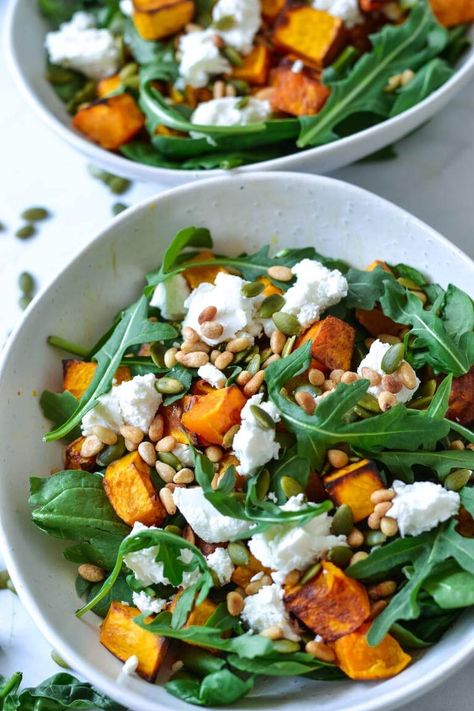 This beautiful and simple salad with crispy, roasted pumpkin, pine nuts, creamy goats cheese and rocket is everything you look for in a salad! Full of earthy flavours and textures, this fresh and healthy pumpkin salad recipe makes a fantastic side dish, or a complete meal on its own. Perfect for entertaining, easy lunches, backyard barbeques and special occasions! Salads For Picnics, Roast Pumpkin Salad, Pine Nuts Salad, Pine Nut Recipes, Pumpkin Salad, Cold Lunches, Goats Cheese, Roasted Pumpkin, Goat Cheese Salad