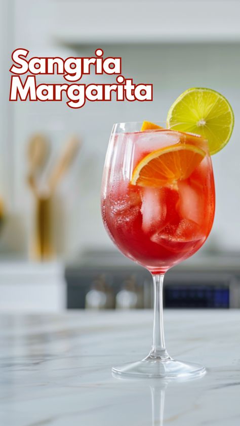 Combining robust red wine with the zest of classic margarita ingredients creates the Sangria Margarita, a favorite among guests. The blend of tequila, orange juice, and sour mix, topped with a delicate layer of red wine, offers a refreshing twist that captivates and refreshes. via @mybartender Sangarita Recipe, Sangria Margarita, Tequila Orange Juice, Tequila Sangria, Best Sangria Recipe, Red Wine Cocktails, Summer Sangria Recipes, Orange Juice Cocktails, Sangria Cocktail