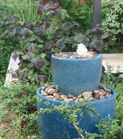 This garden water feature was a quick and easy DIY - it only took an afternoon!  How to make a DIY bubble fountain for your backyard or deck. This style of fountain uses two or more pots - and has a relaxing bubbling sound and pretty waterfall effect down the sides.  A lovely feature for any garden - even if you have a small budget! Bubble Fountain, Fairy Herb Garden, Diy Water Feature, Creative Garden Decor, Outdoor Fountains, Diy Water Fountain, Garden Water Feature, Small Water Features, Diy Garden Fountains