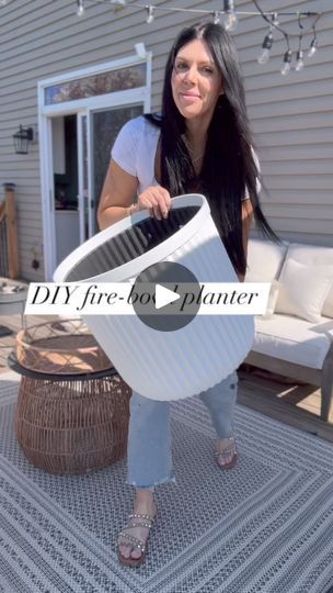 266K views · 3.8K reactions | That viral under $30 planter is back again! This time I’m using it to make a planter/firebowl and it’s so easy anyone can do it! Use a bucket inside the planter to fill up a large portion of the space, next fill with dirt, place smaller planter on top, add lava rock a stainless fire bowl +fuel source I use rubbing alcohol. Fill with fire rock around the glass hurricane and some 🌸 Comment below I’ll send you the links to everything I used! ...#easydiy #planter #home #outdoordecor #patioseason #howto #viralplanter #firebowl #outdoorspace #realtor #spruceupyourspace #midwesthomes #allthingshome #budgetfriendly #lavarock #firepit #hey #momsofig #realtormom #realtortips | Amanda Albrecht | Badger · These Words Burn Barrel Ideas Fire Pits, Fire Pit Sphere, Barrel Fire Pit, Burn Barrel, Tabletop Fire Bowl, Rock Planters, Fire Rocks, Propane Fireplace, Gardens Ideas