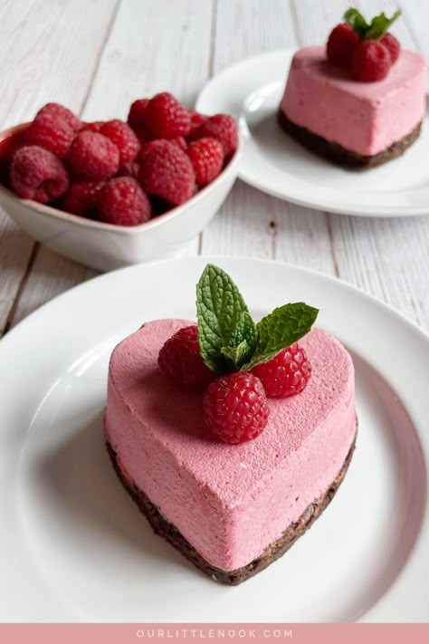 This raspberry mousse is delicate, scrumptious, and airy. The base for the mousse is a gorgeous brownie full of mini chocolate chips. Pair them together and it's a match made in heaven! This elegant dessert is perfect for Valentine's or for any special occasion. #valentinesdessert #desserts #raspberrymousse #raspberrydessert #sweets Romantic Desserts, Raspberry Desserts, Valentines Baking, Raspberry Mousse, Mousse Dessert, Valentine Desserts, Elegant Desserts, Valentines Day Desserts, Valentines Day Dinner