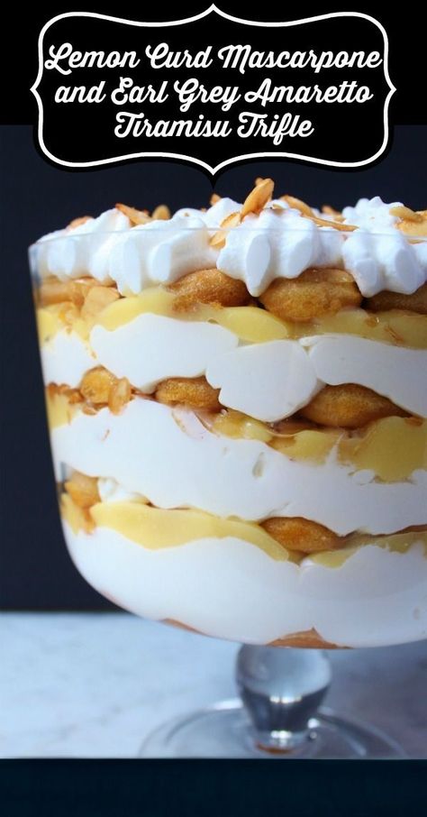 A bright layered Tiramisu Trifle Dessert featuring lemon curd and mascarpone. #tiramisu #trifle #lemoncurd #mascarponecream #dessert #Easterdessert Amaretto Tiramisu, Mascarpone Tiramisu, Lemon Trifle, Pudding Trifle, Tiramisu Trifle, Lemon Tiramisu, Dessert Easter, Lemon Mascarpone, Plating Food