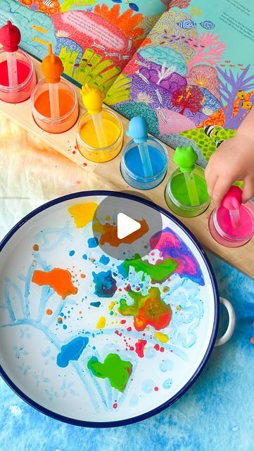 Sally, Phoenix & Nala ~ Sensory & Messy Play Lovers on Instagram: "Magic Milk 🥛 

I couldn’t think of a brighter way than using milk to paint a coral reef… well not normally 😆 I was inspired by @curious_columbus to create this coral reef picture using our paint sticks on our tray. I then covered it in baby oil and set up some milk with food colouring in our new Paint Jar Holder from @clever_bugs 

I’m totally obsessed with the colours of this play- what do you think? 
.
.
.
.
.
 #sensoryplay #sensoryactivity #sensoryplayideas #sensorylearning #sensoryplaytolearn #sensorytray #earlyyearsplay #learningthroughplay #earlylearning #playislearning #playtolearn #montessorikids #earlychildhooddevelopment #earlychildhoodlearning #toddleractivities #toddlerlearning #mumsofinstagram #toddlerdevelop Coral Reef Pictures, Magic Milk, Paint Sticks, Early Childhood Learning, Early Childhood Development, Food Colouring, Messy Play, Painted Jars, Painted Sticks